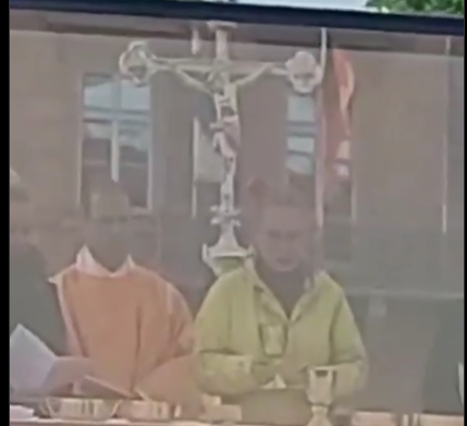 Woman appears to recite words of consecration at German Catholic congress
